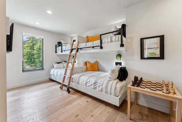 427 Whispering Pines Cir, Blue River, CO 80424 - bedroom with wood-type flooring, baseboards, and recessed lighting