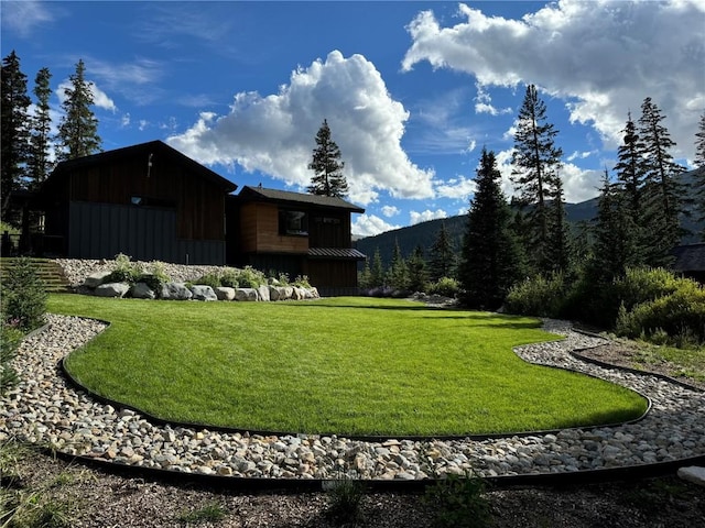 427 Whispering Pines Cir, Blue River, CO 80424 - view of grassy yard with a mountain view