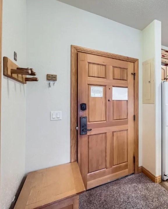 22714 US Highway 6 Unit 5945, Keystone, CO 80435 - entryway featuring electric panel and a textured ceiling