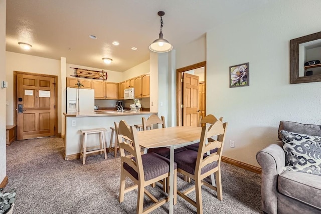 22714 US Highway 6 Unit 5945, Keystone, CO 80435 - dining area featuring carpet floors