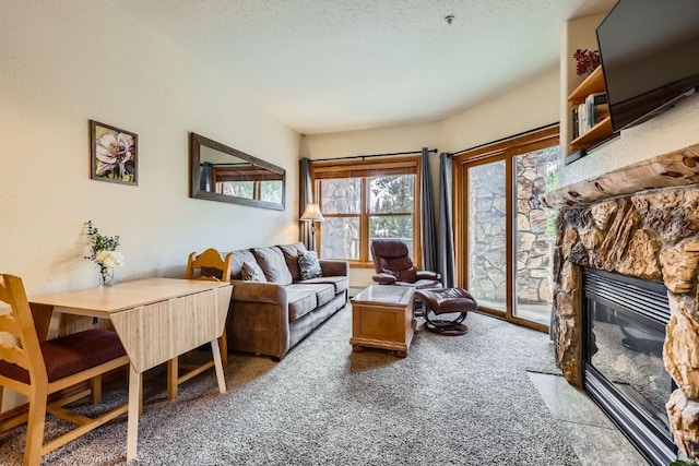 22714 US Highway 6 Unit 5945, Keystone, CO 80435 - living area featuring carpet and a fireplace