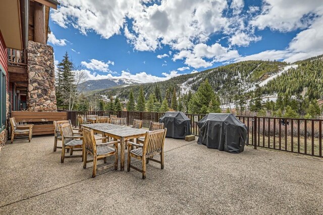 22714 US Highway 6 Unit 5945, Keystone, CO 80435 - view of patio / terrace with a mountain view, area for grilling, and outdoor dining space