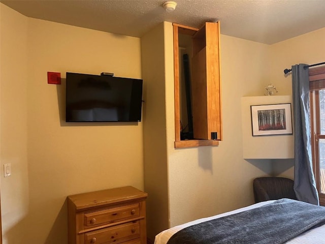 22714 US Highway 6 Unit 5945, Keystone, CO 80435 - bedroom with a textured ceiling