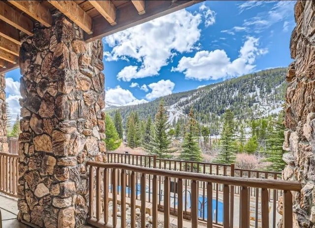 22714 US Highway 6 Unit 5945, Keystone, CO 80435 - balcony featuring a forest view and a mountain view