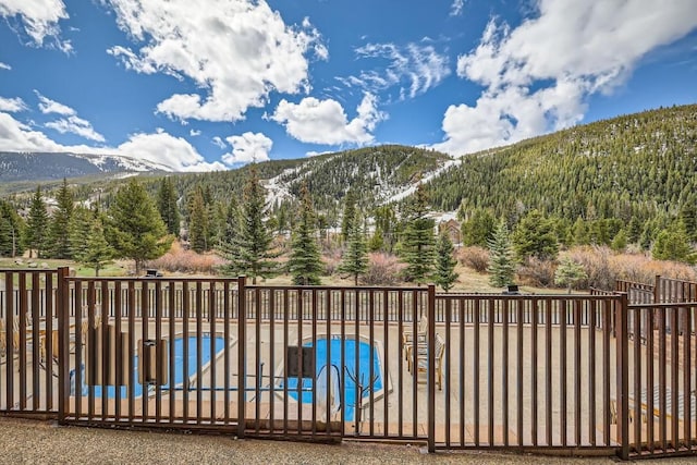 22714 US Highway 6 Unit 5945, Keystone, CO 80435 - view of mountain backdrop with a forest