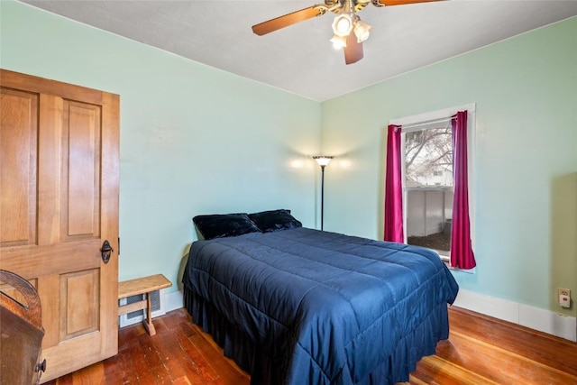 399 E Jefferson Ave, Hayden, CO 81639 - bedroom featuring hardwood / wood-style flooring, baseboards, and a ceiling fan