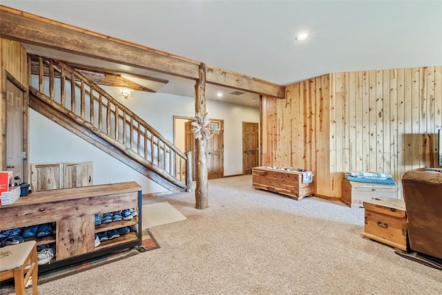 3692 County Road 7, Craig, CO 81625 - living room featuring stairs, carpet, wood walls, and recessed lighting