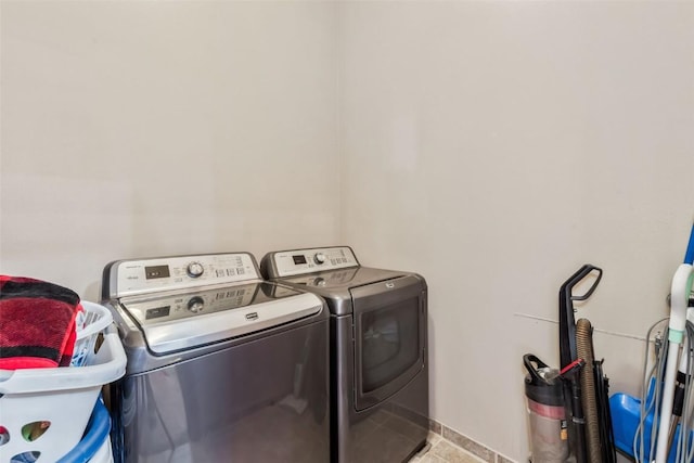 3692 County Road 7, Craig, CO 81625 - clothes washing area with washer and dryer and baseboards