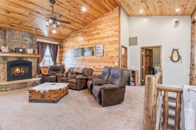 3692 County Road 7, Craig, CO 81625 - carpeted living area with wooden ceiling, a ceiling fan, a stone fireplace, high vaulted ceiling, and recessed lighting