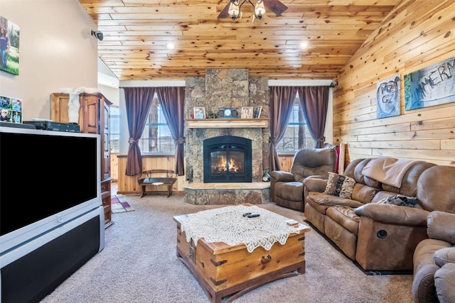 3692 County Road 7, Craig, CO 81625 - living room with vaulted ceiling, carpet floors, wood ceiling, a fireplace, and ceiling fan