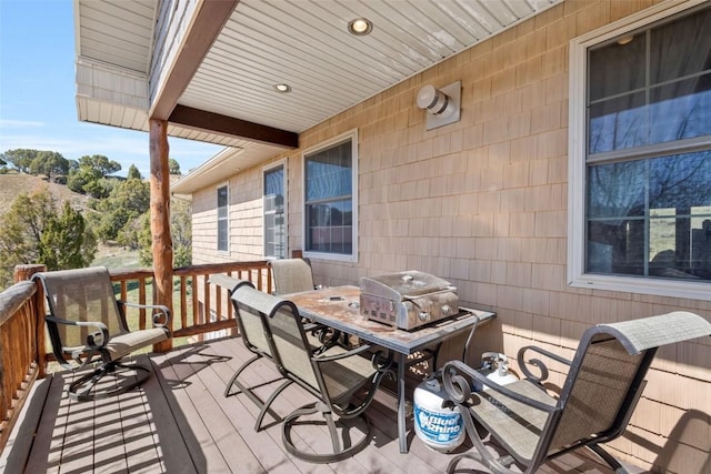 3692 County Road 7, Craig, CO 81625 - wooden deck with outdoor dining area