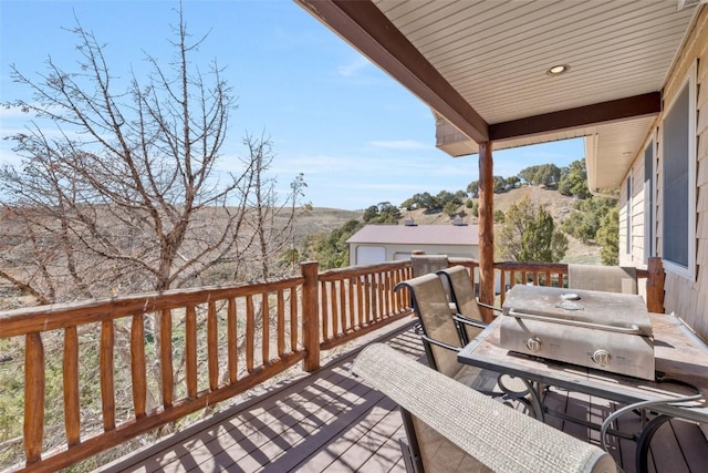 3692 County Road 7, Craig, CO 81625 - wooden deck featuring outdoor dining area and a mountain view
