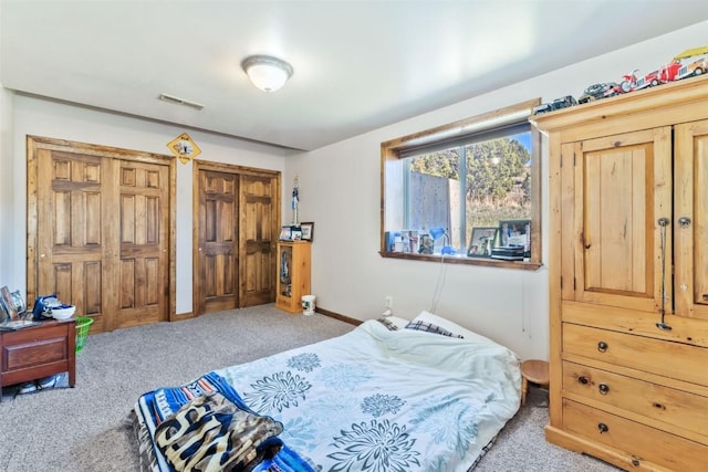3692 County Road 7, Craig, CO 81625 - carpeted bedroom with two closets and baseboards