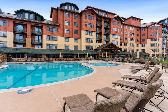 community pool featuring a patio