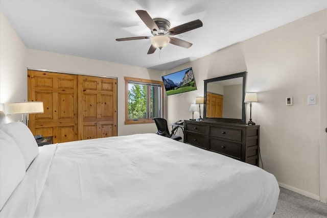 2350 Ski Trail Ln Unit 313, Steamboat Springs, CO 80487 - carpeted bedroom with baseboards and ceiling fan