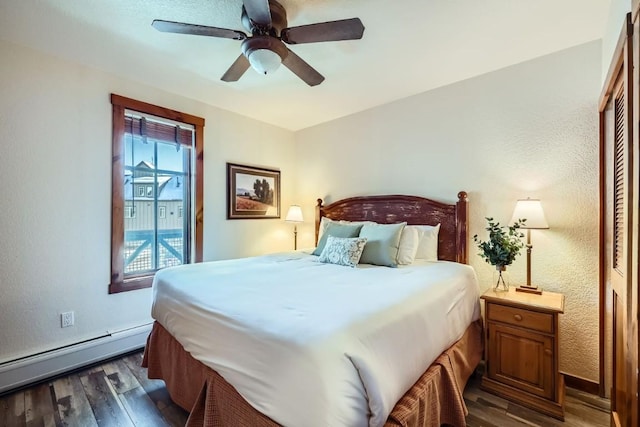 505 S Main St Unit 1313, Breckenridge, CO 80424 - bedroom featuring a baseboard radiator, wood finished floors, access to exterior, and ceiling fan