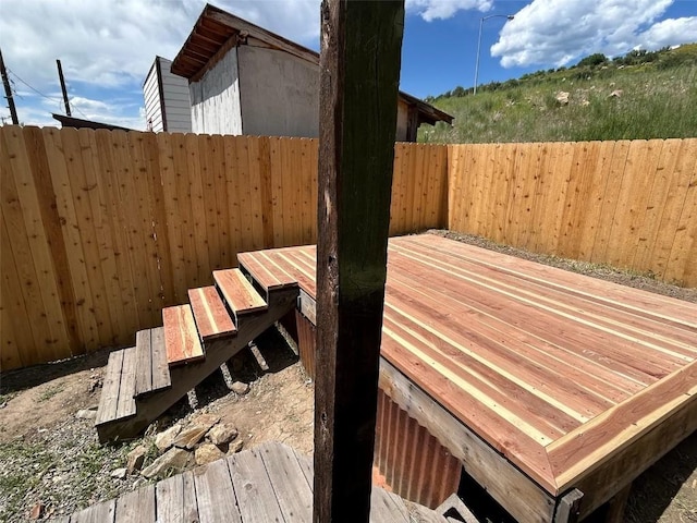 1325 Dream Island Plz Unit 55, Steamboat Springs, CO 80487 - wooden deck with a fenced backyard