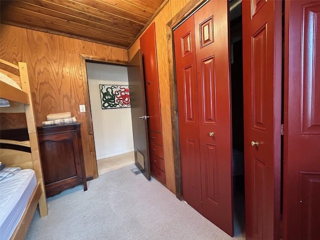 1325 Dream Island Plz Unit 55, Steamboat Springs, CO 80487 - carpeted bedroom with wooden ceiling and wooden walls