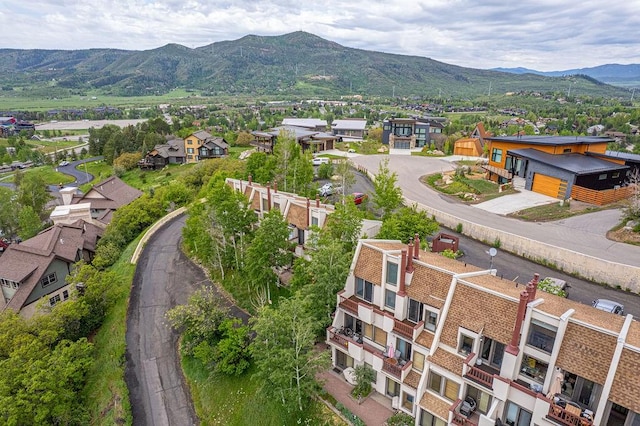 1800 Burgess Creek Rd SW Unit 209, Steamboat Springs, CO 80487 - aerial perspective of suburban area featuring a mountain backdrop