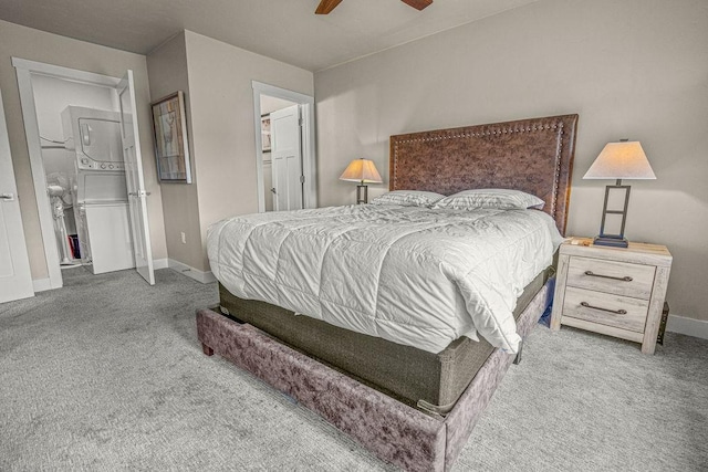 1800 Burgess Creek Rd SW Unit 209, Steamboat Springs, CO 80487 - carpeted bedroom with baseboards and ceiling fan