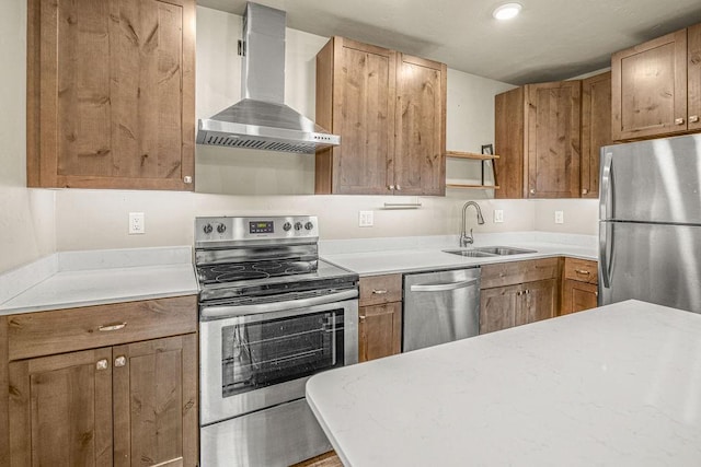 1800 Burgess Creek Rd SW Unit 209, Steamboat Springs, CO 80487 - kitchen featuring appliances with stainless steel finishes, wall chimney exhaust hood, a sink, open shelves, and brown cabinetry