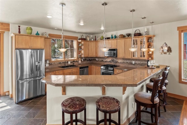 46 Sage View Ct, Dillon, CO 80435 - kitchen with tasteful backsplash, tile counters, open shelves, a sink, and appliances with stainless steel finishes