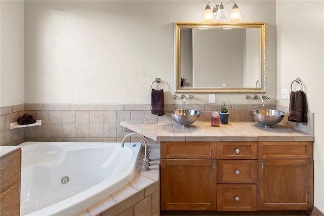 46 Sage View Ct, Dillon, CO 80435 - bathroom featuring a jetted tub, a sink, and double vanity