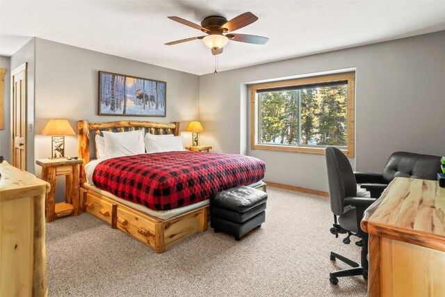 407 S Puma Pl, Fairplay, CO 80440 - bedroom with carpet floors, baseboards, and ceiling fan