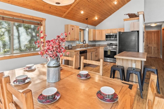 407 S Puma Pl, Fairplay, CO 80440 - dining area with wood ceiling, light wood finished floors, and high vaulted ceiling