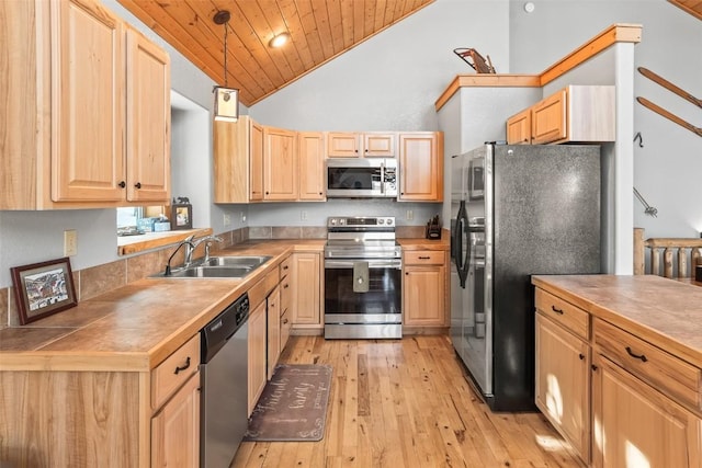 407 S Puma Pl, Fairplay, CO 80440 - kitchen with wood ceiling, light brown cabinets, stainless steel appliances, and a sink