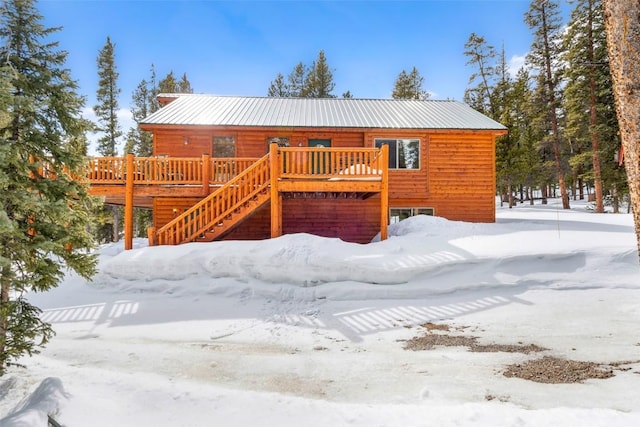 407 S Puma Pl, Fairplay, CO 80440 - snow covered house with a deck