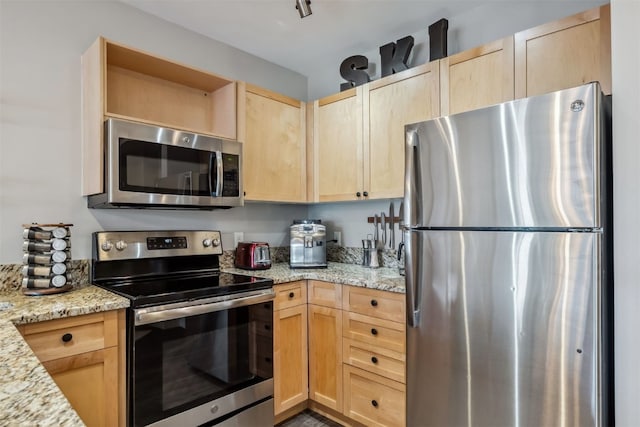 140 Ida Belle Dr Unit 8292, Keystone, CO 80435 - kitchen featuring open shelves, appliances with stainless steel finishes, light brown cabinets, and light stone counters