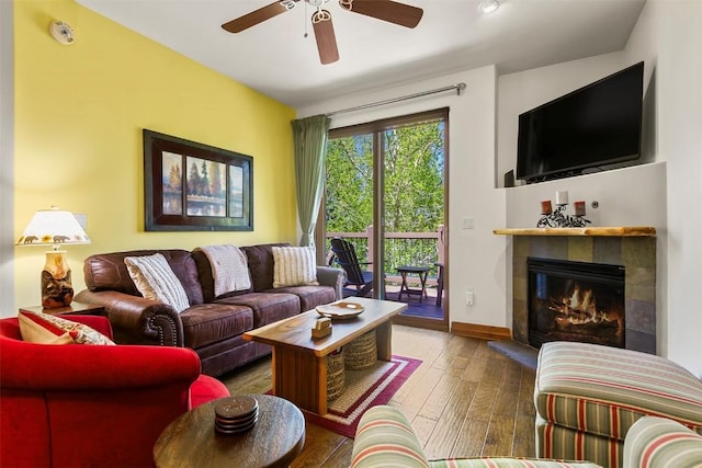 34 Highfield Trl Unit 312, Breckenridge, CO 80424 - living area featuring ceiling fan, wood-type flooring, and a tile fireplace