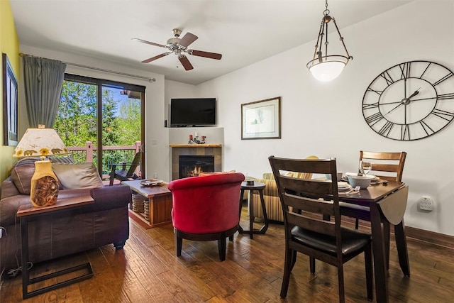34 Highfield Trl Unit 312, Breckenridge, CO 80424 - living room featuring hardwood / wood-style floors, ceiling fan, a fireplace, and radiator heating unit