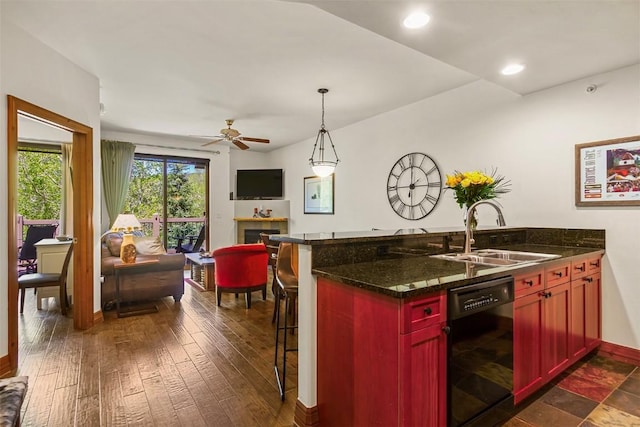 34 Highfield Trl Unit 312, Breckenridge, CO 80424 - kitchen featuring black dishwasher, ceiling fan, a peninsula, dark brown cabinets, and open floor plan