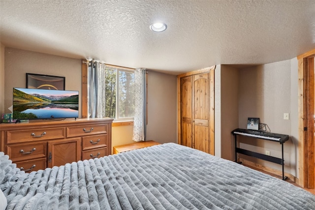 889 Venture Rd, Fairplay, CO 80440 - bedroom featuring a textured ceiling