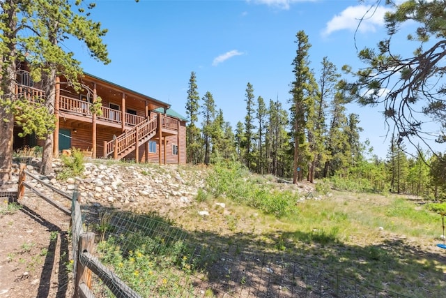 889 Venture Rd, Fairplay, CO 80440 - view of yard featuring a wooden deck and stairs