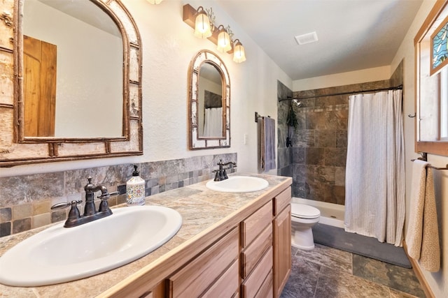 889 Venture Rd, Fairplay, CO 80440 - bathroom with a tile shower and double vanity