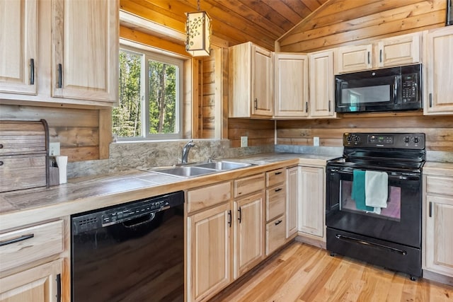 889 Venture Rd, Fairplay, CO 80440 - kitchen with black appliances, light brown cabinets, vaulted ceiling, light wood-style flooring, and wood ceiling