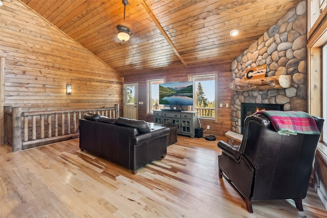 889 Venture Rd, Fairplay, CO 80440 - living area featuring lofted ceiling, wooden ceiling, plenty of natural light, light wood finished floors, and wood walls