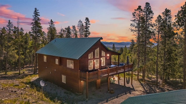 889 Venture Rd, Fairplay, CO 80440 - view of side of property with a deck and a metal roof