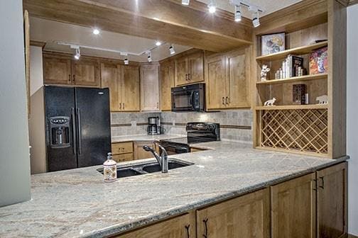 765 Columbine Rd Unit C103, Breckenridge, CO 80424 - kitchen featuring black appliances, track lighting, a sink, backsplash, and open shelves