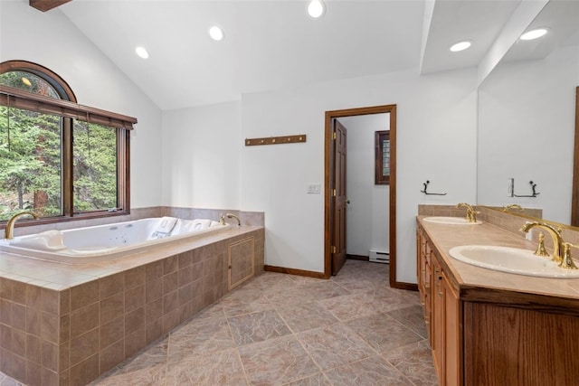 272 Doris Dr, Breckenridge, CO 80424 - bathroom featuring a baseboard radiator, double vanity, a tub with jets, lofted ceiling, and recessed lighting