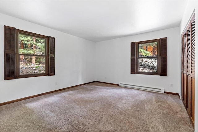 272 Doris Dr, Breckenridge, CO 80424 - unfurnished bedroom with a baseboard radiator, carpet flooring, baseboards, and a closet