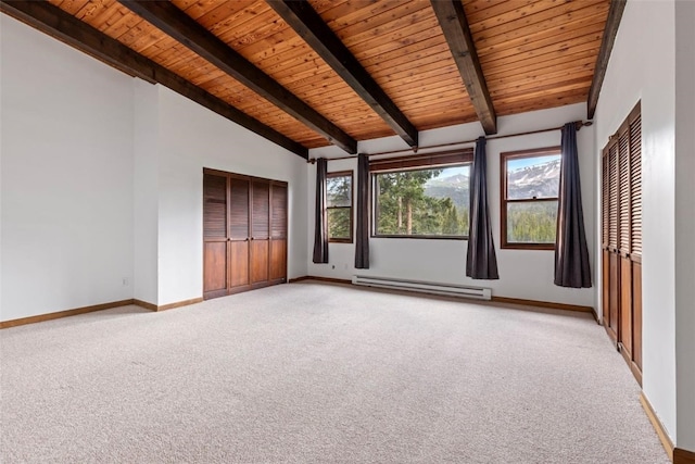 272 Doris Dr, Breckenridge, CO 80424 - unfurnished room with a baseboard radiator, light carpet, wooden ceiling, and baseboards