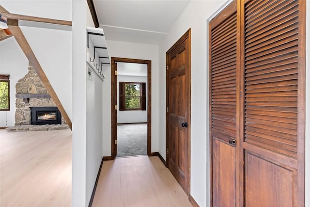 272 Doris Dr, Breckenridge, CO 80424 - hall featuring light wood finished floors, baseboards, and a heating unit