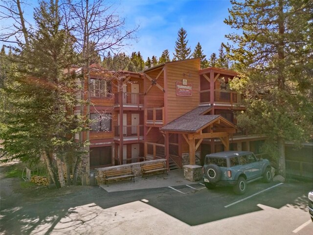 805 Columbine Rd Unit 202, Breckenridge, CO 80424 - view of front of home featuring uncovered parking and a balcony