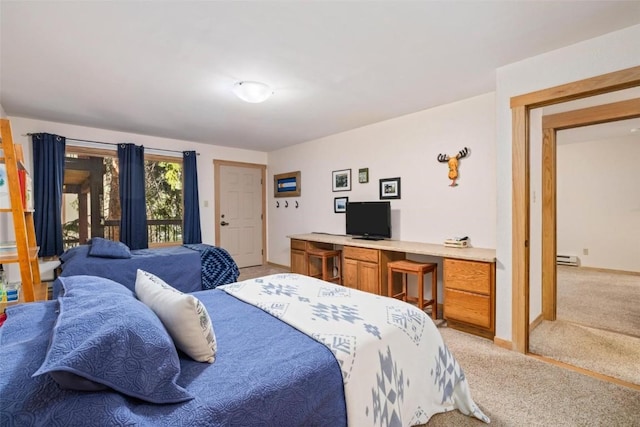 805 Columbine Rd Unit 202, Breckenridge, CO 80424 - bedroom with light colored carpet, access to exterior, a desk, a baseboard heating unit, and baseboards