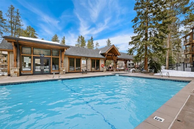 805 Columbine Rd Unit 202, Breckenridge, CO 80424 - community pool featuring a patio area and french doors