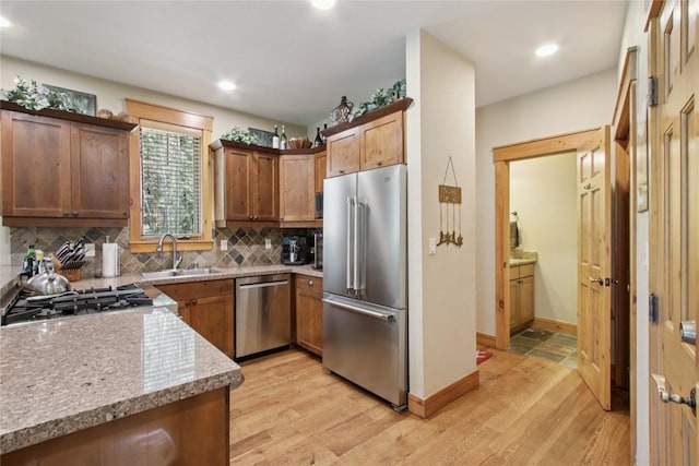 188 Tip Top Trl Unit 6558, Dillon, CO 80435 - kitchen featuring appliances with stainless steel finishes, light wood finished floors, tasteful backsplash, and recessed lighting
